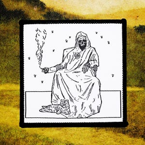 May include: Black and white patch depicting a robed, skeletal figure seated and holding a smoking object, with a cat at its feet. The patch has a black border and is set against a yellow and green background.