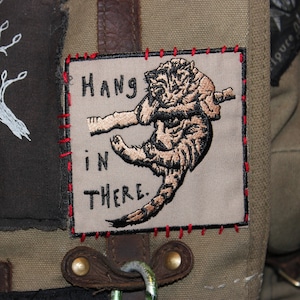 HANG IN THERE | embroidered cat patch, funny sad cat iron on patch, goth animal patch for jackets, alt fabric patch for diy fashion