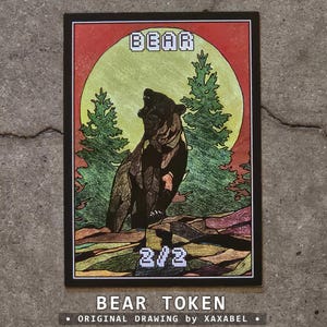 May include: A rectangular game card featuring a black bear standing on rocky terrain in front of two green pine trees and a large yellow moon against a red sky. The word BEAR is printed in white pixelated text at the top and 2/2 at the bottom.