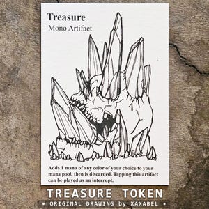 May include: A rectangular white card featuring a black ink line drawing of a skull embedded within jagged crystals. The text reads Treasure, Mono Artifact, and includes game instructions. The bottom edge displays the text TREASURE TOKEN.