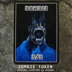 May include: A rectangular game card featuring a dark, abstract painting of a screaming figure with blue tones at the bottom. The word ZOMBIE is printed in white pixelated text at the top, and the numbers 2/2 are printed in white pixelated text at the bottom.