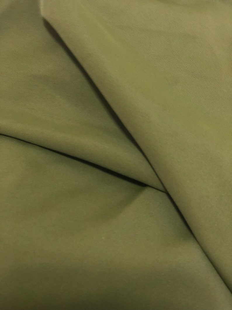 olive green nylon backpack