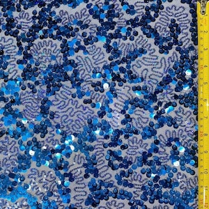 Bochtige kronkelende pailletten op doorzichtige mesh-stof (blauw) | (4-way stretch/op maat geknipt)