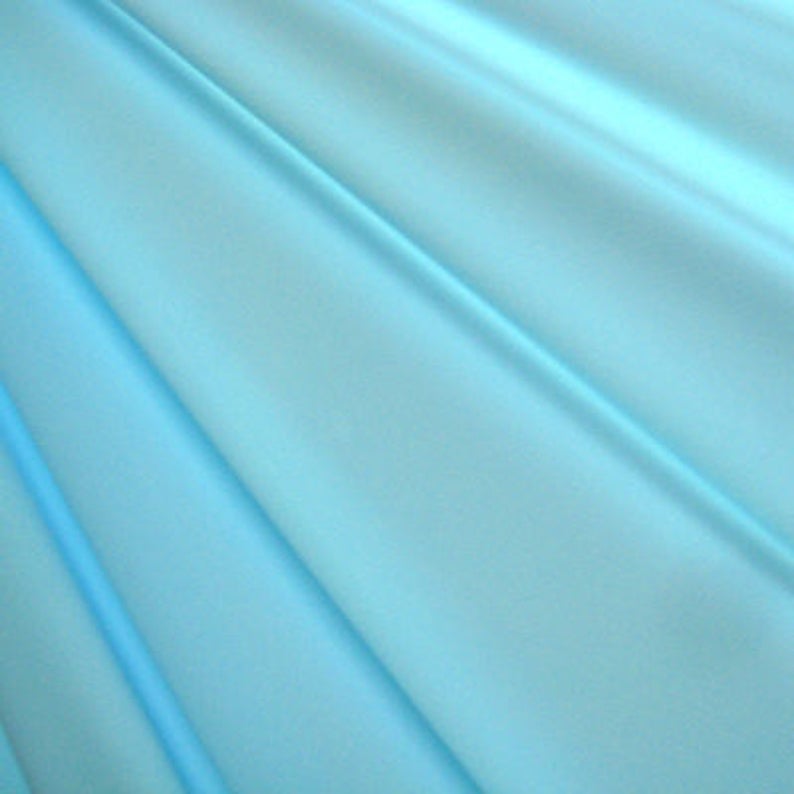 | Baby Blue 4 Way StretchPer Yard Shiny Finish Milliskin Nylon Spandex Fabric