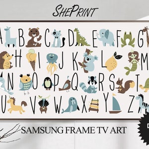 May include: A colorful alphabet chart with animals and objects representing each letter. The letters are in black and the background is white. The chart is framed in brown.