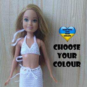 May include: White crochet bikini top and skirt set for a doll. The set is made with love from Ukraine. Choose your color.