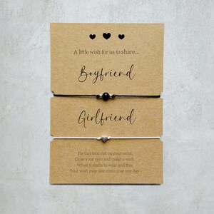 May include: Two friendship bracelets with a card that reads "A little wish for us to share... Boyfriend Girlfriend Tie this bracelet on your wrist, Close your eyes and make a wish. When it starts to wear and fray Your wish may just come true one day."