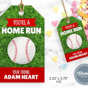 May include: A green and red baseball-themed gift tag with a white baseball in the center. The tag reads "You're a Home Run" and "Your Friend, Adam Heart". The tag measures 2.25 inches by 3.75 inches.