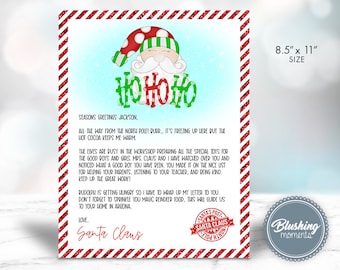 May include: An illustration of Santa Claus in red and green with the text "Ho Ho Ho" and a letter addressed to Jackson. The letter reads "Seasons Greetings Jackson, All the way from the North Pole!  ... It's freezing up here but the hot cocoa keeps me warm. The elves are busy in the workshop preparing all the special toys for the good boys and girls. Mrs. Claus and I have watched over you and noticed what a good boy you have been. You made it on the nice list for helping your parents, listening to your teacher, and being kind. Keep up the great work! Rudolph is getting hungry so I have to wrap up my letter to you. Don't forget to sprinkle you magic reindeer food. This will guide us to your home in Arizona. Love, Santa Claus". The letter is 8.5 inches by 11 inches.