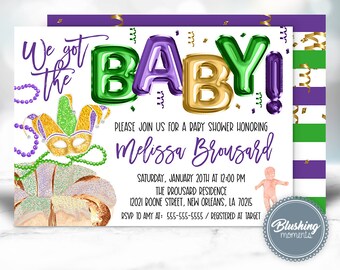 May include: A baby shower invitation with a Mardi Gras theme. The invitation features a purple, green, and gold color scheme with a gold glitter crown, a gold glitter mask, and a gold glitter king cake. The invitation also features the words "We got the BABY!" in gold, green, and purple balloon letters.