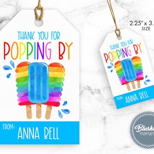 May include: White gift tags with a popsicle design. The tags read "Thank You For Popping By" in colorful text. The popsicle is rainbow-colored with a blue center. The tags are 2.25" x 3.75" in size and include the name "Anna Bell".