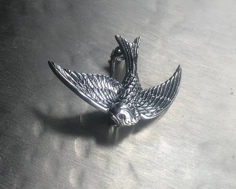 Victorian style silver swallow brooch
