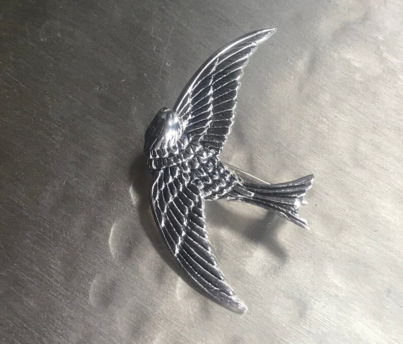 Victorian style silver swallow brooch