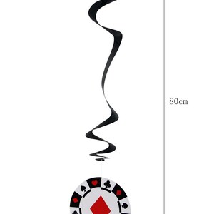 May include: A casino-themed hanging decoration. The decoration features a black spiral streamer attached to a white poker chip with red, black, and white suit symbols. The poker chip is 16 cm in diameter, and the streamer is 80 cm long.
