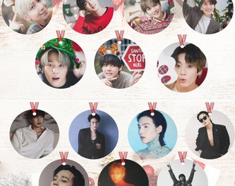 May include: Twelve round Christmas ornaments featuring images of a popular K-pop group. Each ornament features a different member of the group in a festive setting.