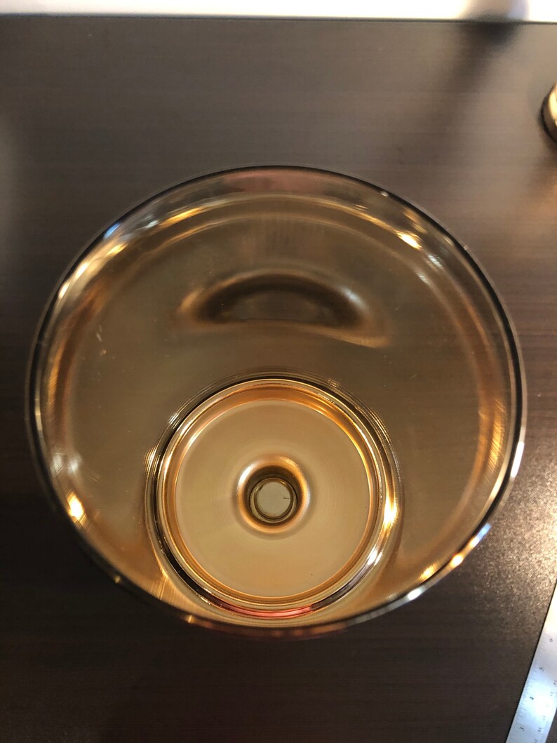 Stainless steel and glass candle holder set