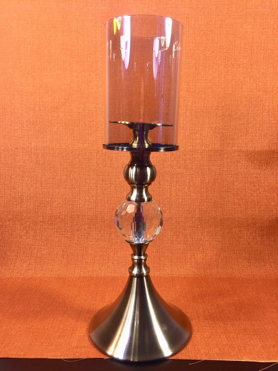 Stainless steel and glass candle holder set
