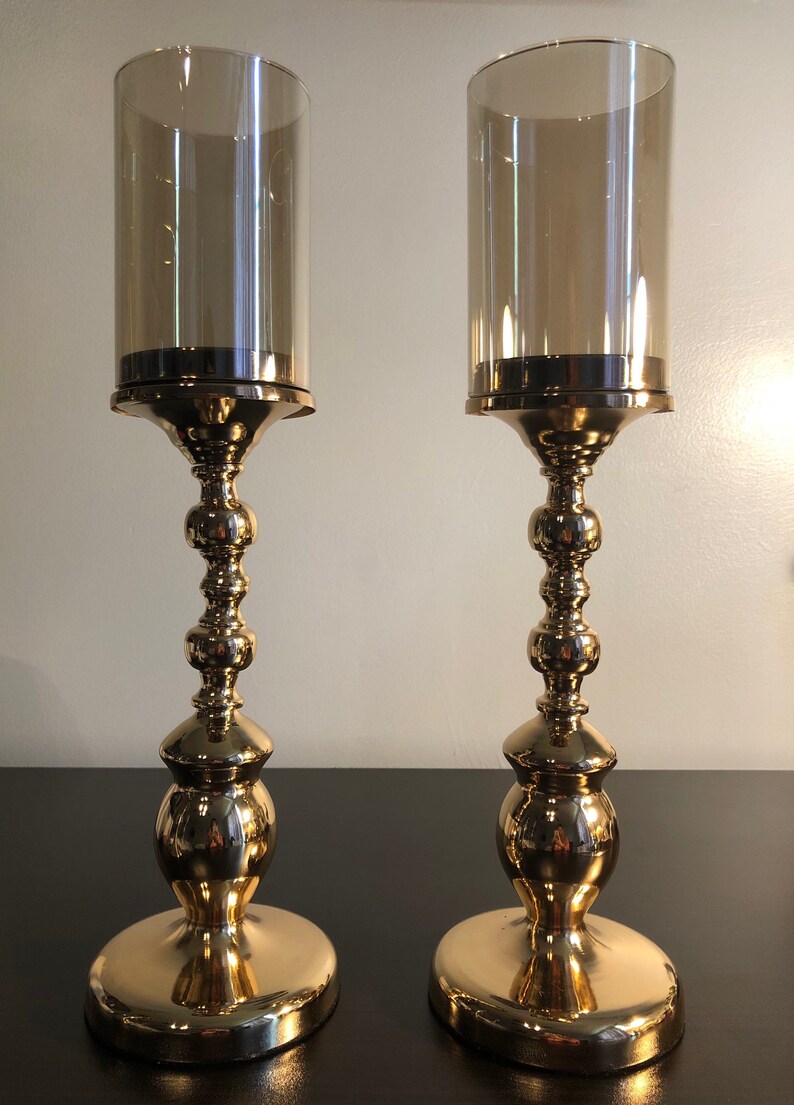 Stainless steel and glass candle holder set