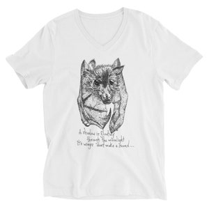 May include: A white V-neck t-shirt with a black and white illustration of a bat and the text "A shadow is floating through the moonlight. It's wings don't make a sound..."