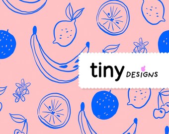 May include: A pink background with a repeating pattern of blue fruit illustrations, including bananas, lemons, oranges, cherries, and flowers. The text "tiny designs" is displayed on a white label.