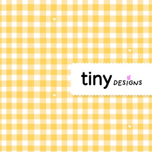 May include: A yellow and white gingham pattern background with the text "tiny designs" in black script. A small pink butterfly graphic is next to the word "designs". Small white hearts are scattered across the background.