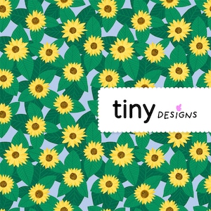 Peut inclure: Un motif sans couture représentant des tournesols jaunes avec des centres bruns et des feuilles vertes sur un fond bleu clair. Le texte "tiny DESIGNS" est dans un cadre blanc avec un papillon rose.
