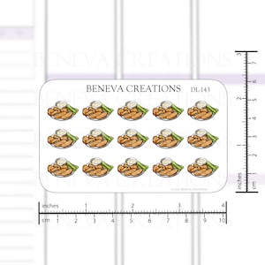 May include: A sheet of 12 stickers featuring a cartoon illustration of chicken wings with celery sticks and dipping sauce. The stickers are printed on white paper with a clear background. The stickers are approximately 2.5 cm in diameter.