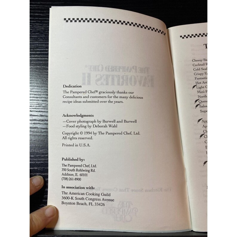 May include: Open book page with text from "The Pampered Chef Favorites II" cookbook. The page includes a dedication, acknowledgments, and publishing information. Copyright 1994 by The Pampered Chef, Ltd. Printed in U.S.A.