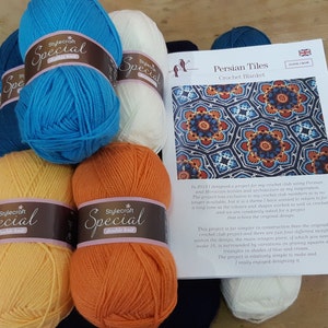 May include: A selection of Stylecraft Special Double Knit yarn balls in various colours, including blue, yellow, and orange, with a pattern for a "Persian Tiles Crochet Blanket." The pattern features a geometric design.