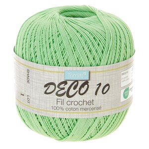 May include: A ball of pale green crochet thread, labelled "DECO 10 Fil crochet 100% coton mercerisé". The thread is tightly wound and appears soft. The label also includes the brand name "Trimits".