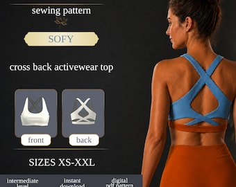 May include: A digital sewing pattern for a sports bra titled SOFY, featuring a cross back activewear top design. The image displays front and back technical illustrations of the white sports bra, with text indicating sizes XS-XXL and intermediate level.