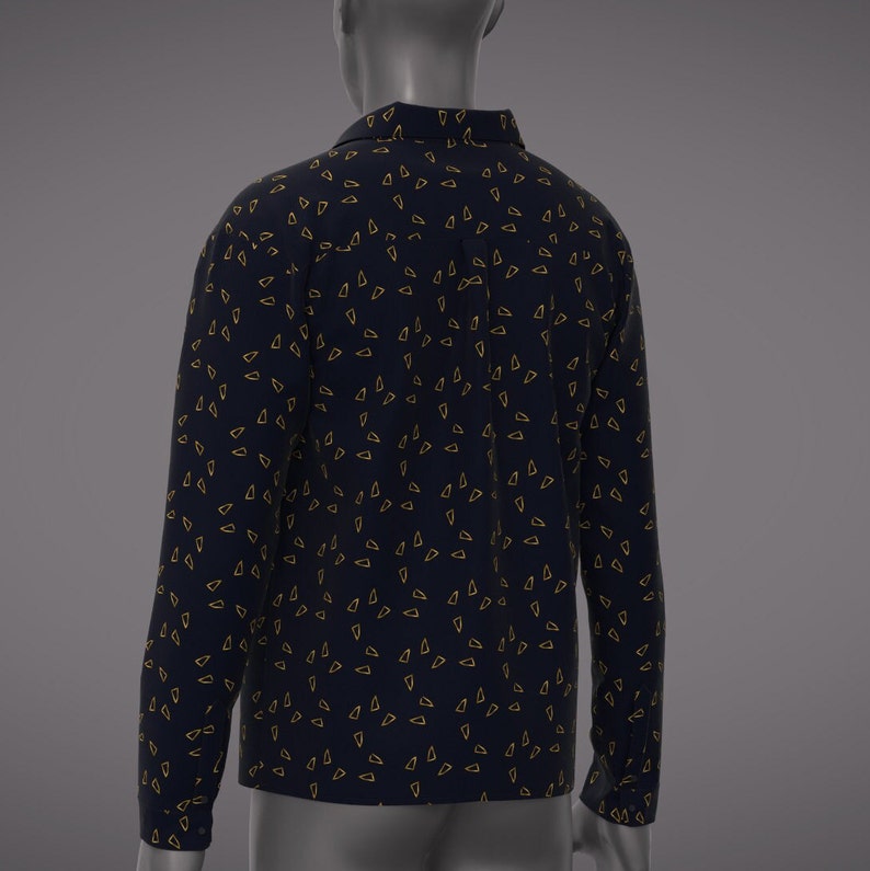 May include: A long-sleeved shirt with a dark blue background and a pattern of small, gold triangles.