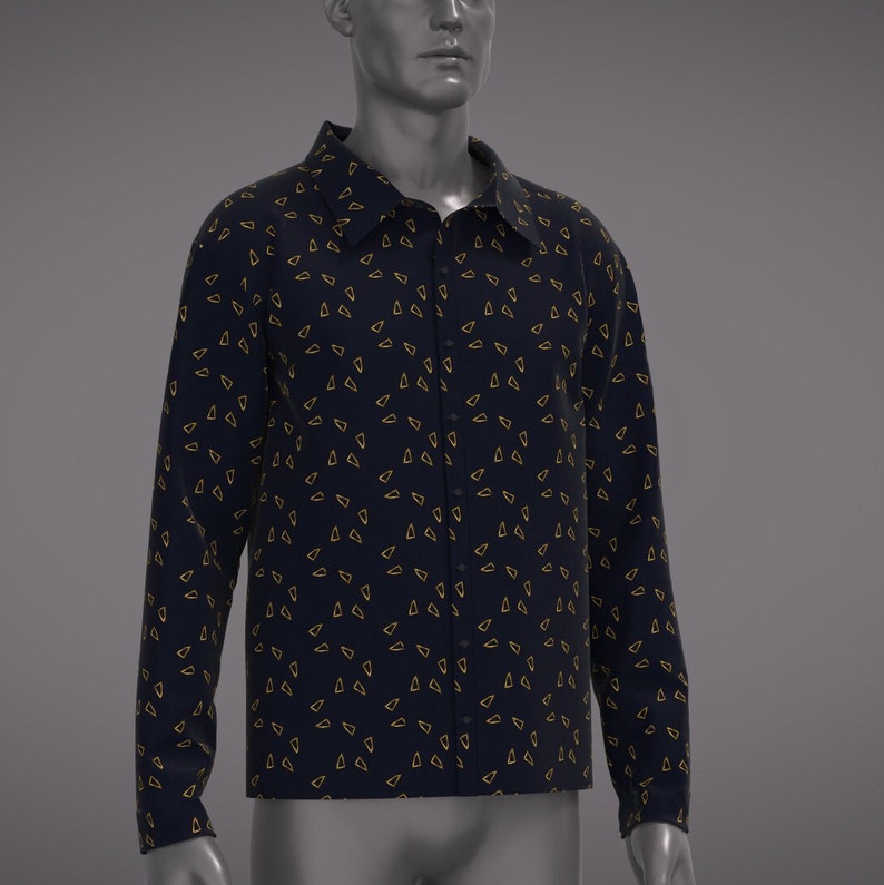 May include: A long-sleeved button-down shirt with a dark blue background and a pattern of small gold triangles.