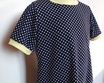 T-shirt dress, in organic cotton jersey, navy blue with white polka dots, anise yellow edges, short sleeves, sizes 2 years 4 years 8 years