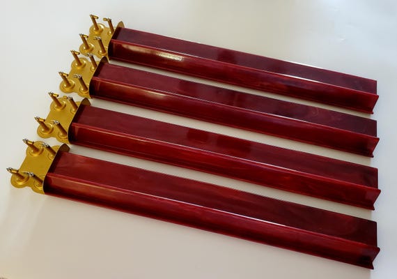 Set of Four Burgundy Swirl Catalin Racks by Cowen, Circa 1920s Bakelite
