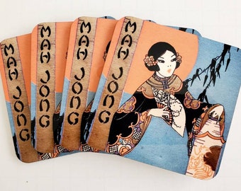 Fyra stycken underlägg med Mahjong-tema från Buzza, ca 1920-talet