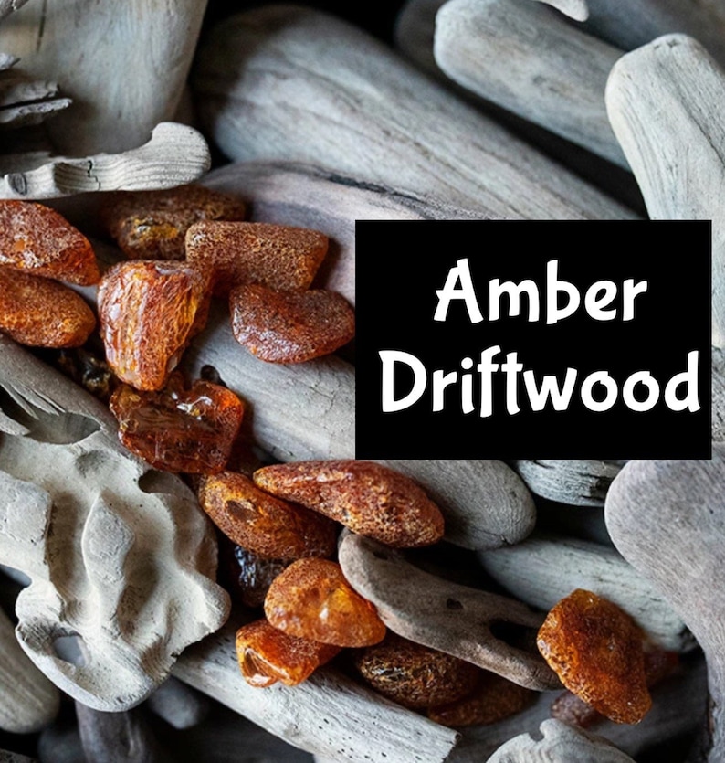 May include: Amber colored stones and pieces of driftwood. The text "Amber Driftwood" is displayed on a black background.
