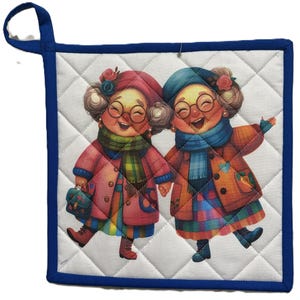 May include: Quilted pot holder with a blue border and hanging loop. The center features a colorful illustration of two elderly women laughing and holding hands. They are wearing coats, scarves, and hats.
