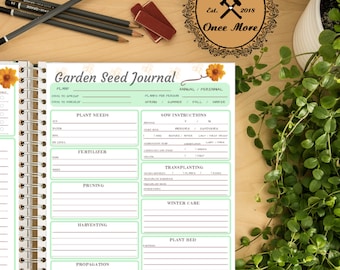 May include: A green and white garden seed journal with a floral design. The journal has sections for plant needs, sow instructions, transplanting, winter care, harvesting, propagation, and plant bed. The journal is titled "Garden Seed Journal".