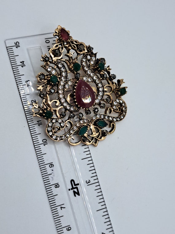 Gold tone jewel colored rhinestone brooch - image 2