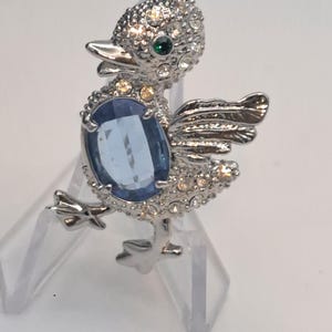 Silver tone rhinestone duck brooch