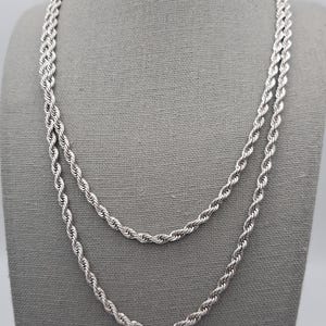 Silver toned rope chain necklace