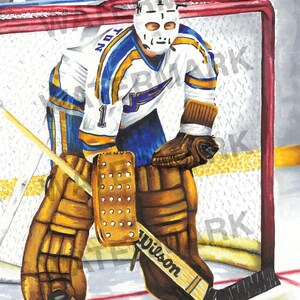May include: A watercolor painting of a hockey goalie wearing a white, blue, and gold uniform with a white mask. The goalie is standing in front of a red and white hockey net with a wooden stick in their hand. The goalie is wearing a Wilson brand goalie pad on their left leg.