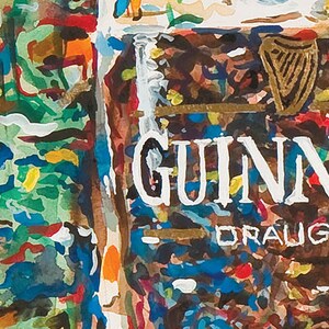 May include: A close-up of a Guinness beer bottle with a white label and the words "GUINNESS DRAUGHT" printed on it. The label is surrounded by a colorful, abstract background.