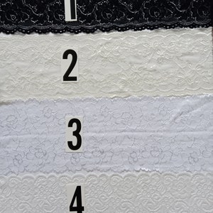 May include: Four samples of lace trim, numbered 1 through 4. The first sample is black lace, the remaining three are white lace.
