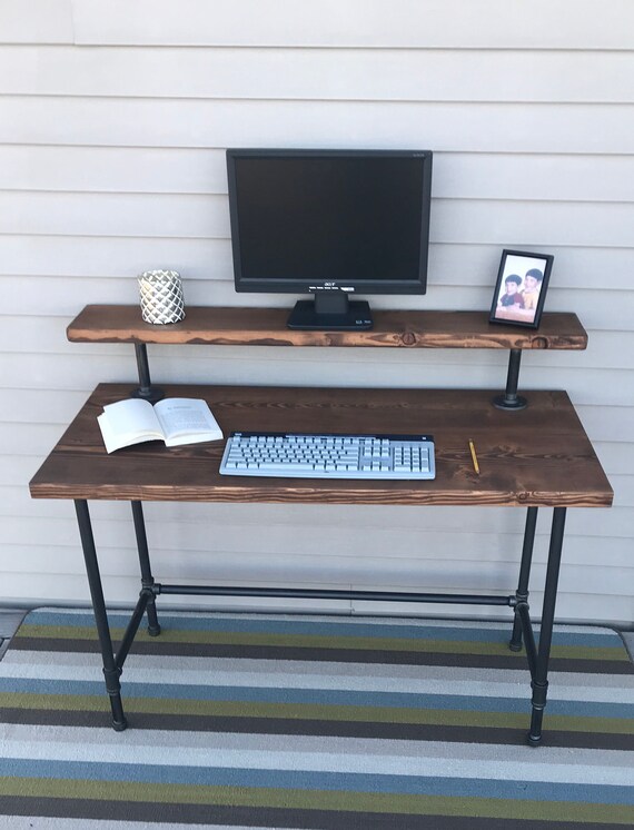 Industrial Wood Desk With Iron Pipe Legs And A Monitor Shelf