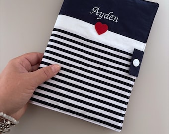 Personalized unisex baby health record book cover, navy and white striped with a red heart, snap closure, machine embroidered, baby gift idea
