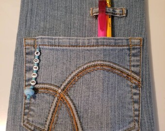 Altered composition book/journal/upcycled jeans