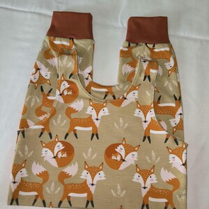 Babystrampler Gr. 62/68 mit Füchsen unisex