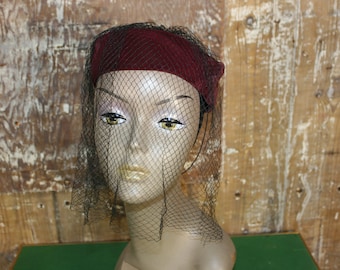Vintage 50s wine red velvet pillbox hat with small black veil